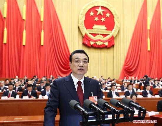 Chinese Premier Li Keqiang delivers a government work report at the opening meeting of the first session of the 13th National People's Congress at the Great Hall of the People in Beijing, capital of China, March 5, 2018. (Xinhua/Ju Peng)