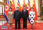 Xi Jinping (2nd R), general secretary of the Central Committee of the Communist Party of China (CPC) and Chinese president, and his wife Peng Liyuan (1st R) meet with Kim Jong Un (2nd L), chairman of the Workers' Party of Korea (WPK) and chairman of the State Affairs Commission of the Democratic People's Republic of Korea (DPRK), and his wife Ri Sol Ju at the Great Hall of the People in Beijing, capital of China. At the invitation of Xi, Kim paid an unofficial visit to China from March 25 to 28. During the visit, Xi held talks with Kim. (Xinhua/Ju Peng)